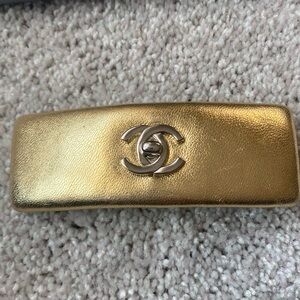 Chanel gold with silver hardware hair clip. Vintage wear.